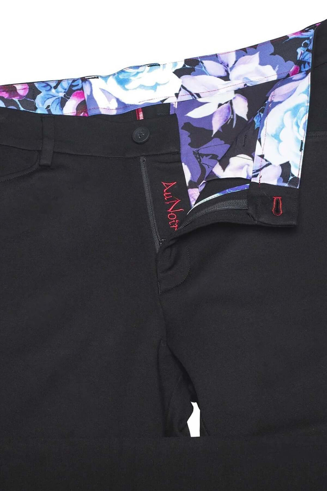 Pantalon de style Magnum avec ceinture à motif floral et coupe ajustée, idéal pour un look moderne.