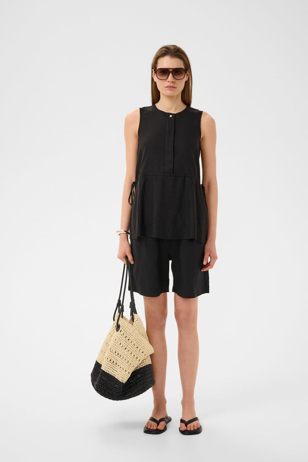 Front view of a beige straw handbag Inwear with woven details for women - Valérie Simon