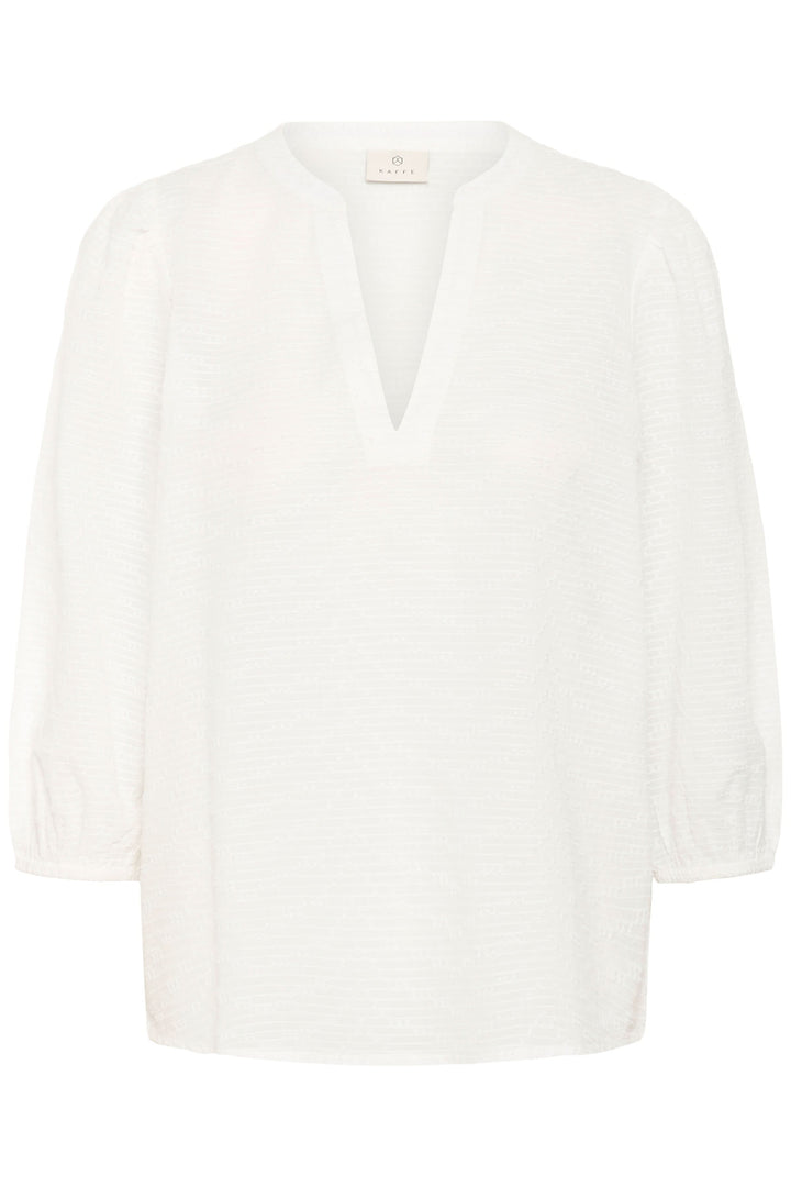 Blouse Penelope texturée à manches trois-quarts avec encolure en V et poignets élastiqués pour une silhouette élégante et féminine.