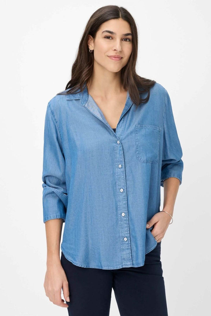 Blouse en jean VIVIEN, coupe droite, col chemise, détails raffinés, style urbain élégant.