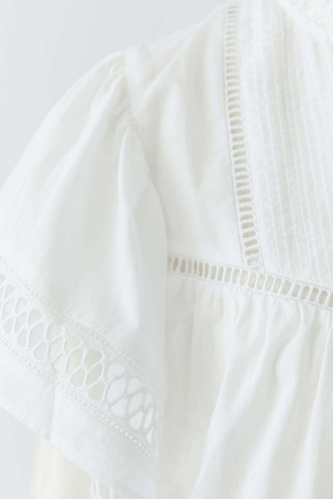 Flowy blouse with openwork details