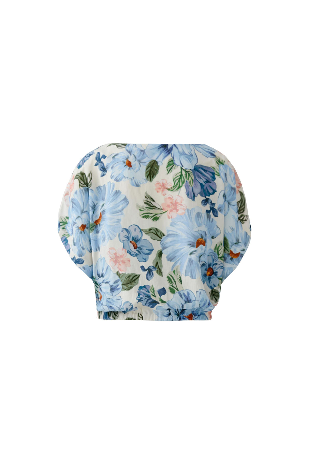 Blouse fluide à manches courtes avec motif floral bleu pour un look élégant et féminin.