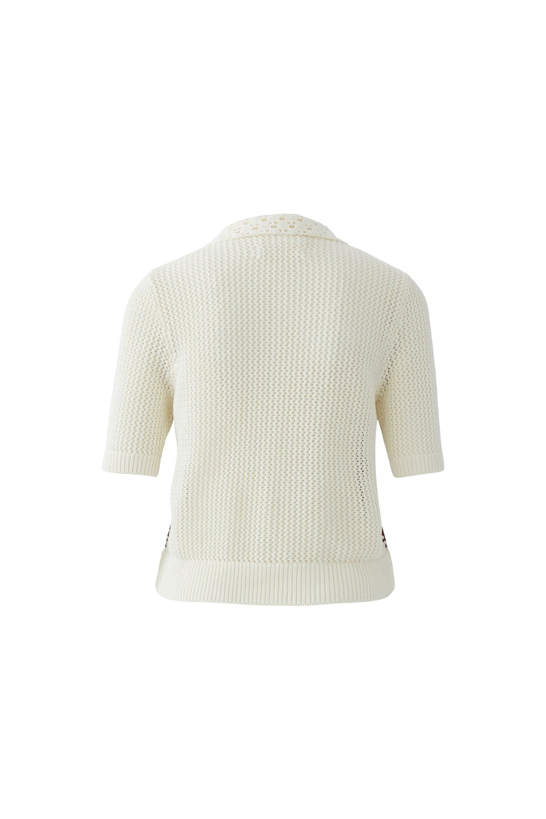 Blouse manches courtes en tissu texturé avec col ajouré et détails artisanaux, vue arrière. Décris moi le produit en français.