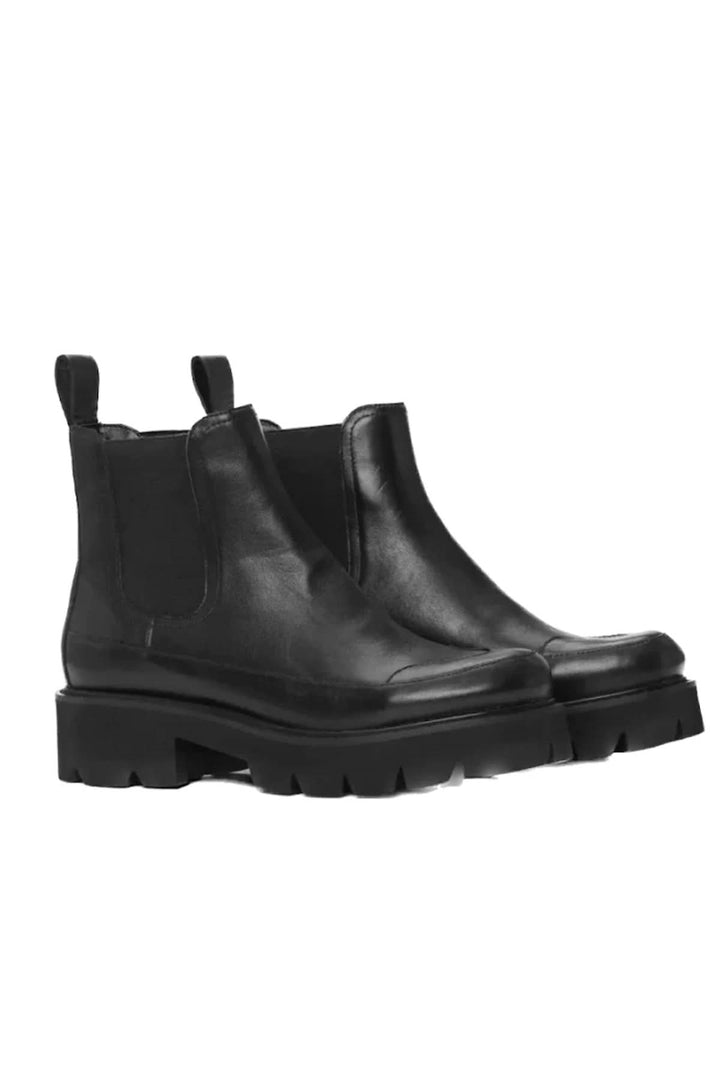 Bottes Miley en similicuir noir, style chelsea avec semelle crantée, parfaites pour le confort et la durabilité.