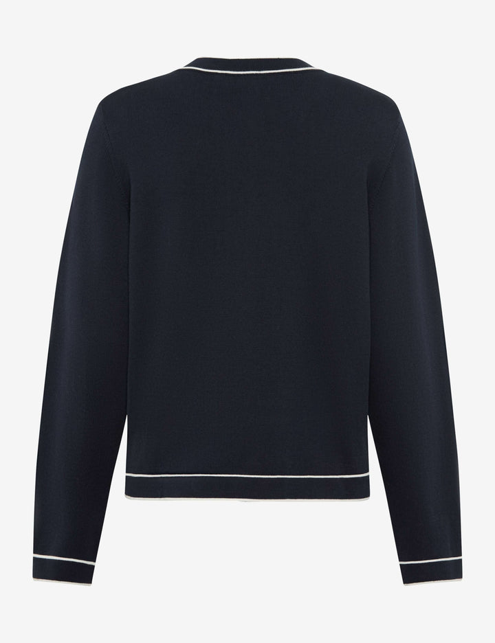 Vue arrière du cardigan boutonné à col contrasté ANN avec finitions contrastées sur fond blanc, idéale pour superpositions élégantes.