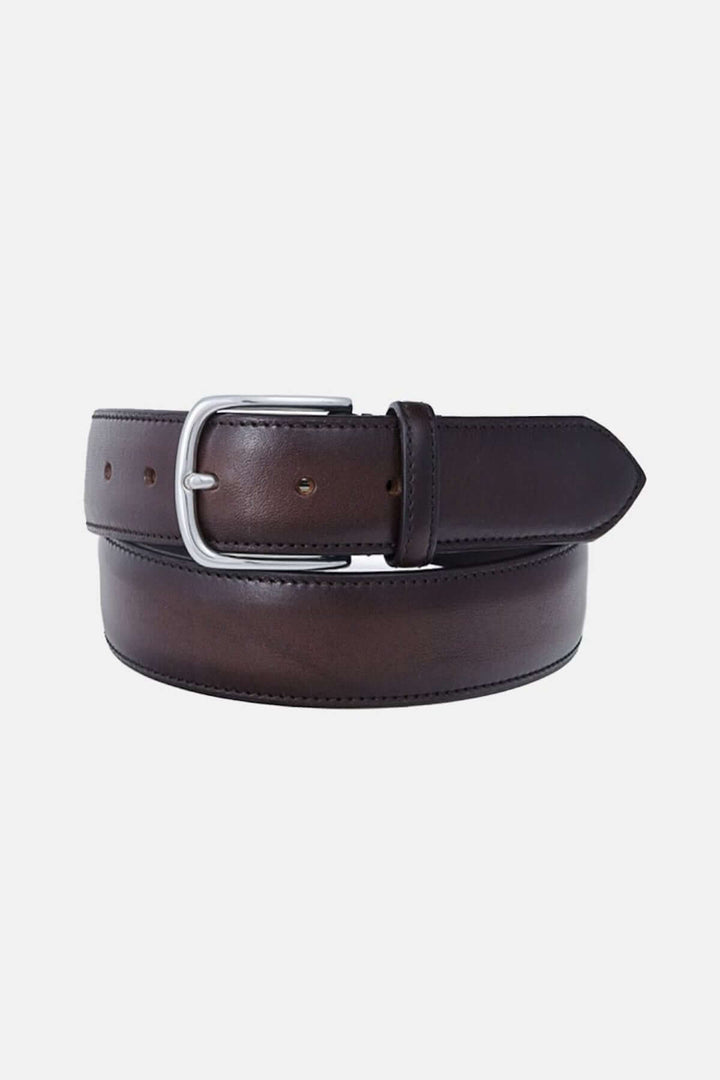 Ceinture élégante en cuir teinté avec boucle métallique brossée, fabriquée à la main en Italie, accessoire de mode artisanal.