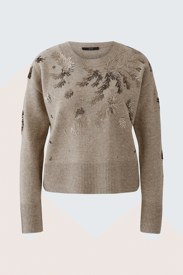 Chandail broderies en tricot doux avec motifs scintillants et encolure ronde, parfait pour un style élégant au quotidien.