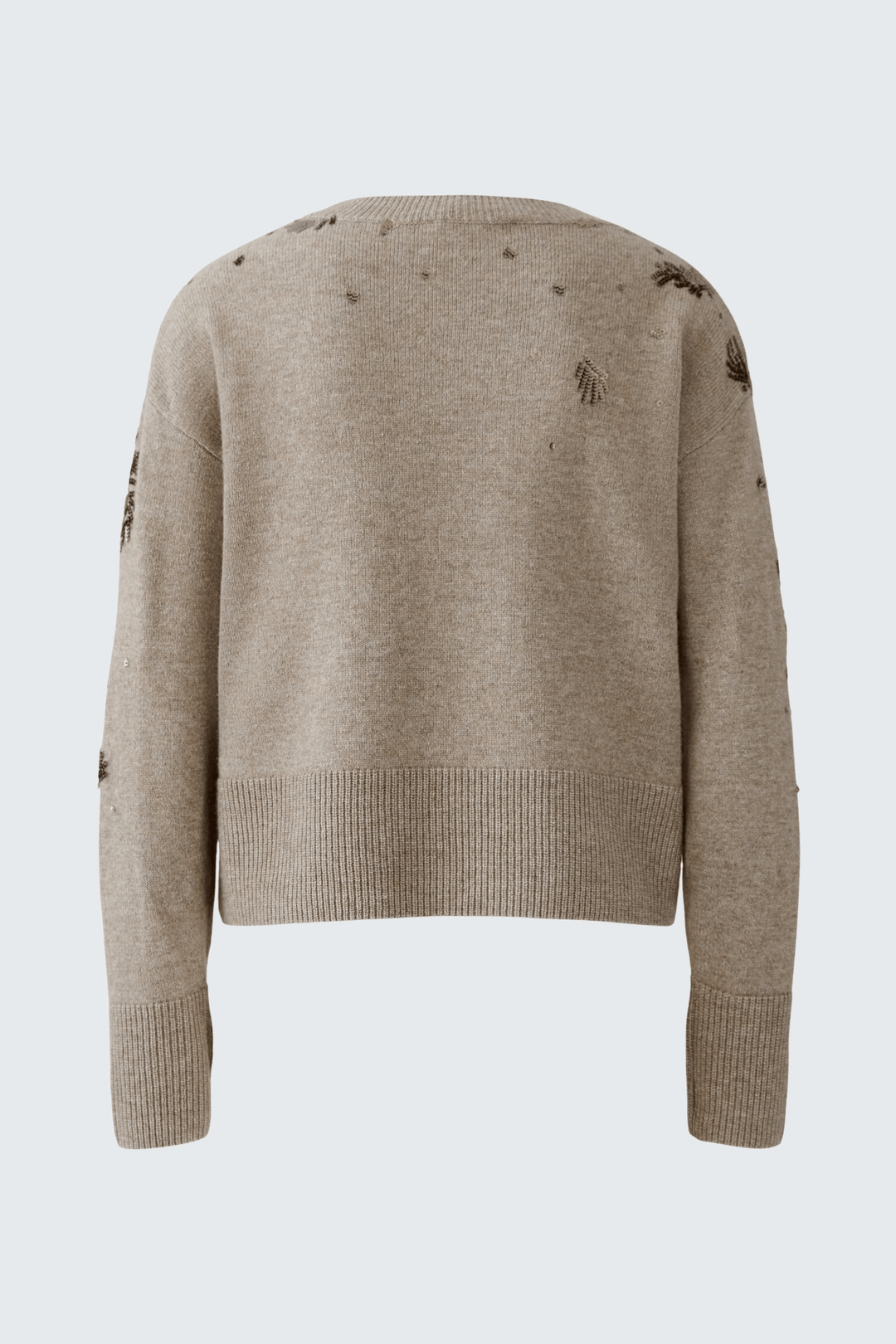 Chandail broderies avec coupe droite et encolure ronde, motifs festifs et élégants brodés pour un style raffiné et confortable.