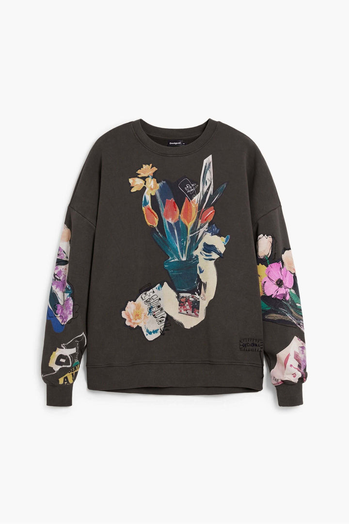 Chandail collage dessin avec motif floral artistique et manches longues pour un look casual créatif.