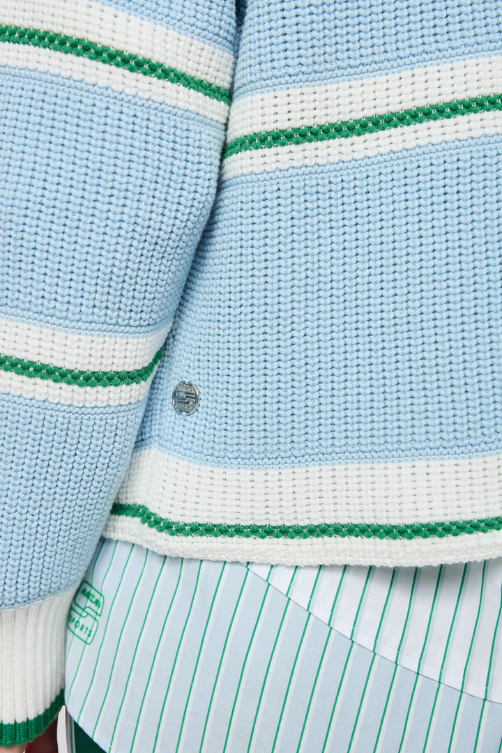 Chandail en maille rayée avec motif graphique et coupe ample, manche longue en bleu et vert, idéal pour superposer ou porter seul.