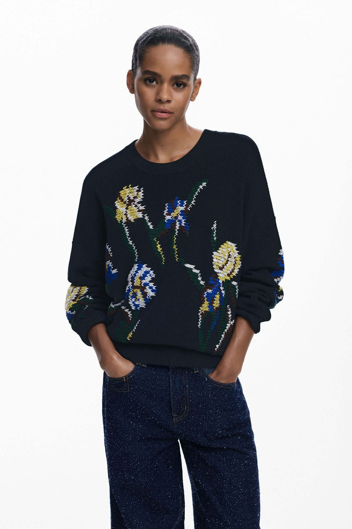 Chandail à fleurs brodées avec motifs floraux colorés, coupe ample et encolure ronde, idéal pour une tenue décontractée et élégante.