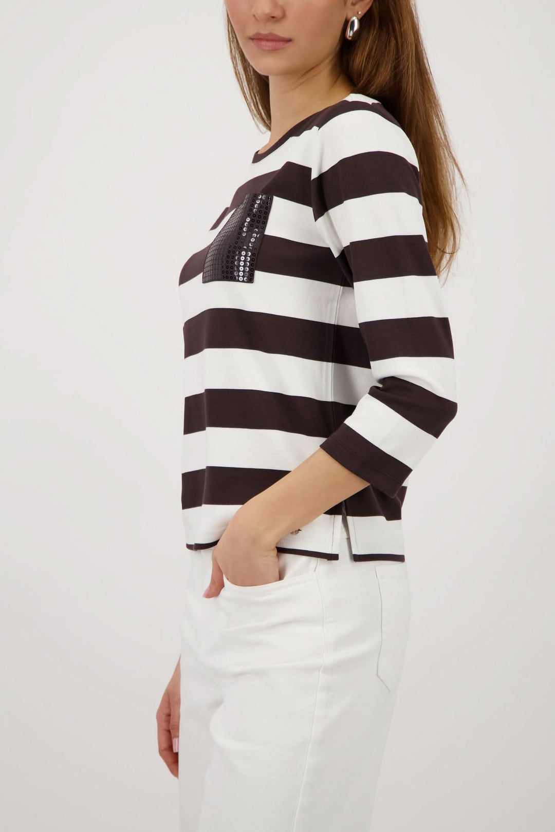 Striped sweater with a decorative pocket