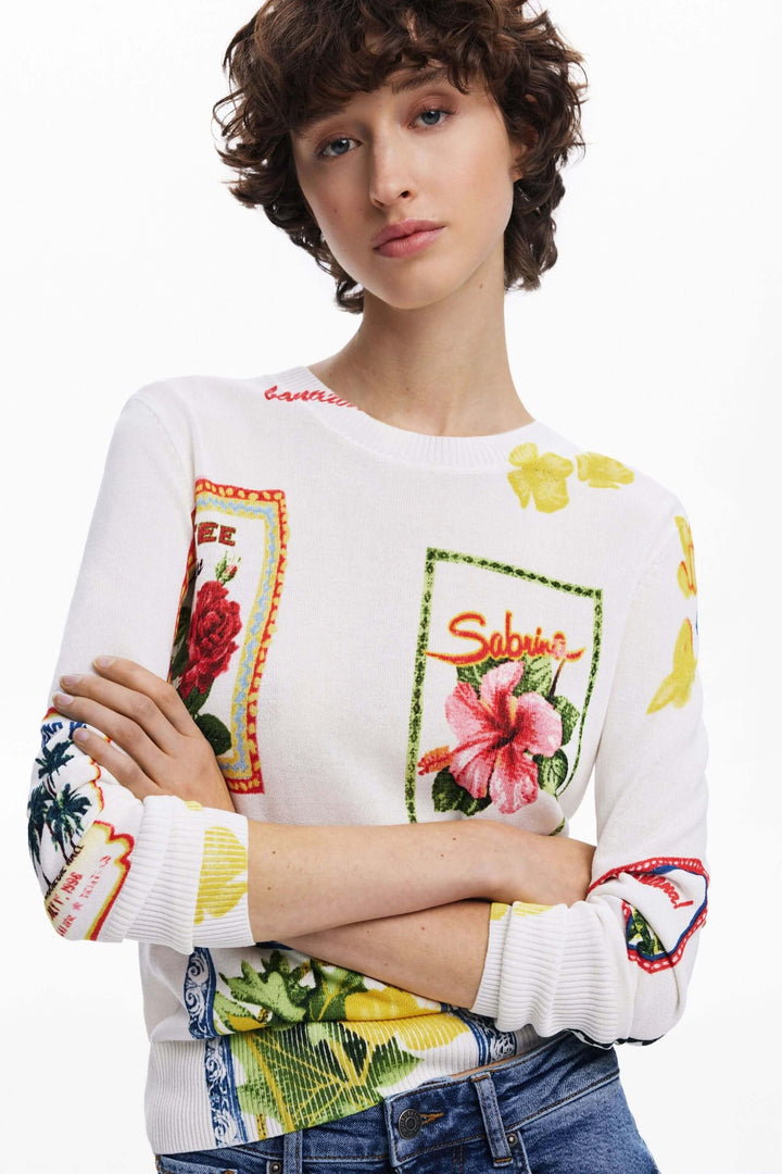 Chandail à timbres tropicaux avec imprimés floraux et manches longues, style chic et décontracté.