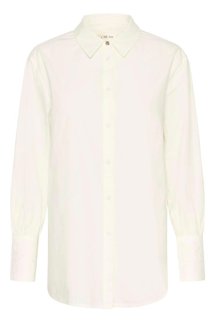 Chemise Alison blanche élégante avec col classique et patte de boutonnage, tissu doux et coupe fluide.