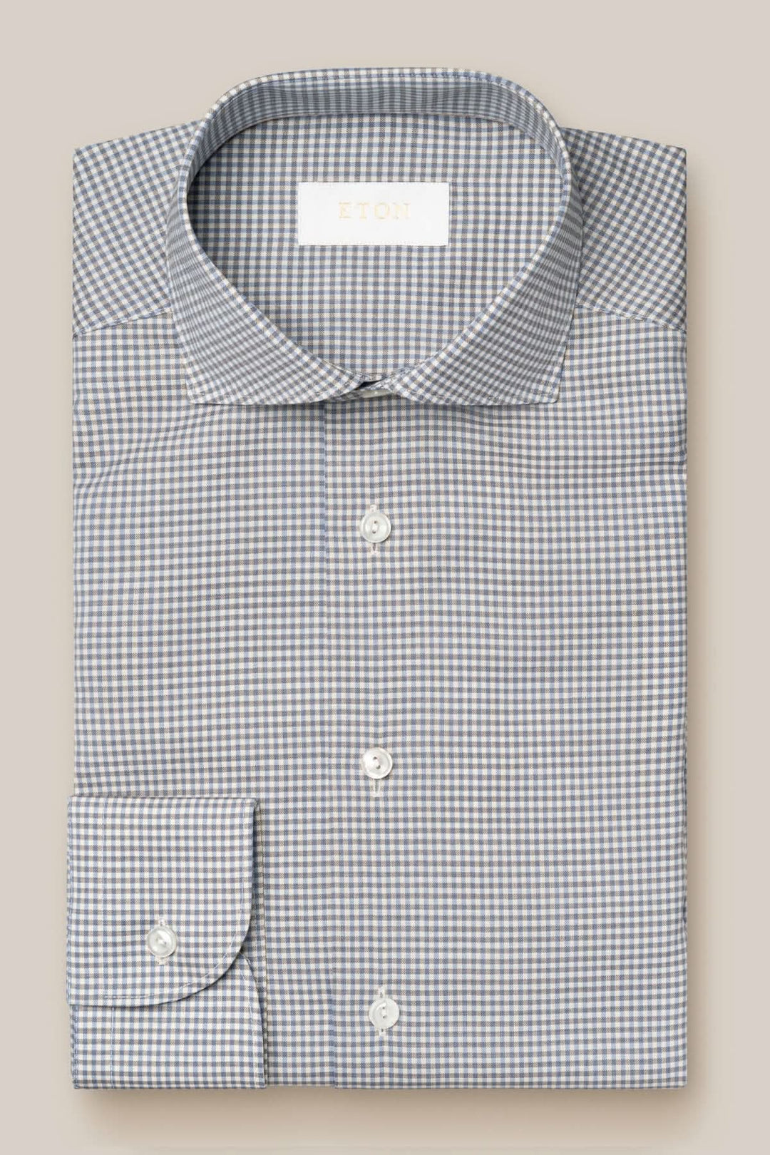 Chemise en laine mérinos à micro-carreaux, bouton, col classique, confectionnée en Italie.
