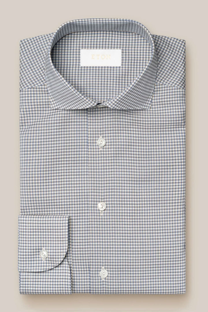 Chemise en laine mérinos à micro-carreaux, bouton, col classique, confectionnée en Italie.