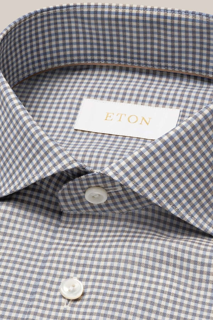 Chemise en laine mérinos à micro-carreaux, fabriquée par Eton, avec boutons en nacre et étiquette élégante.