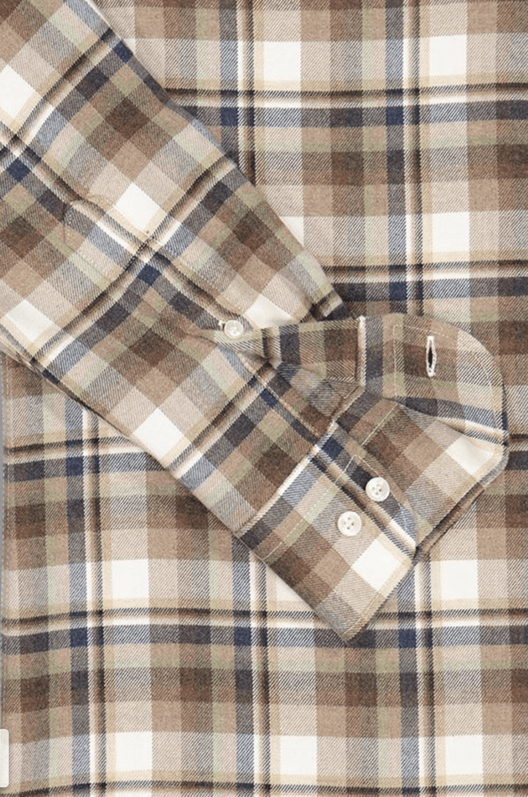 Chemise en flanelle à carreaux multicolores en tissu doux et épais, avec manche retroussée et boutons visibles, style automnal décontracté.
