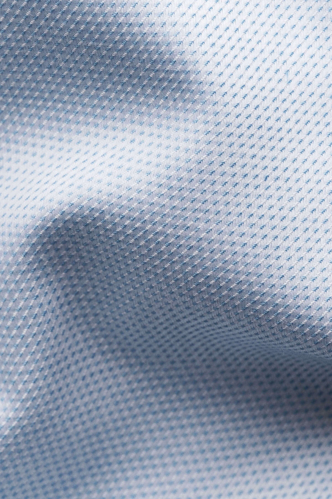 Texture du tissu de la chemise motif discret, doux et raffiné.
