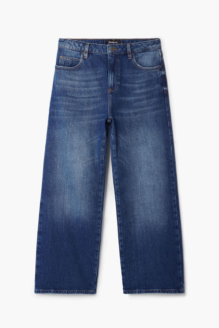 Jeans imprimé fleur en denim bleu avec coupe ample et taille régulière, idéale pour un look décontracté.