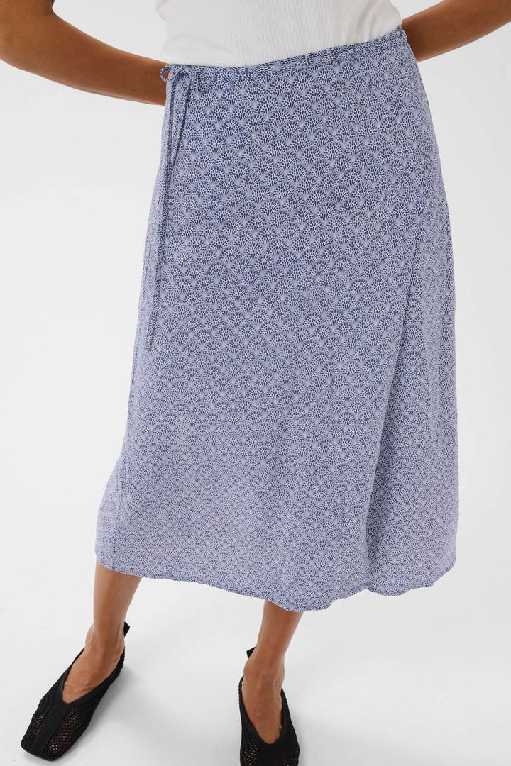 Jupe Arielle - Jupe midi fluide avec imprimé délicat et taille ajustable, coupe évasée pour un look estival élégant.