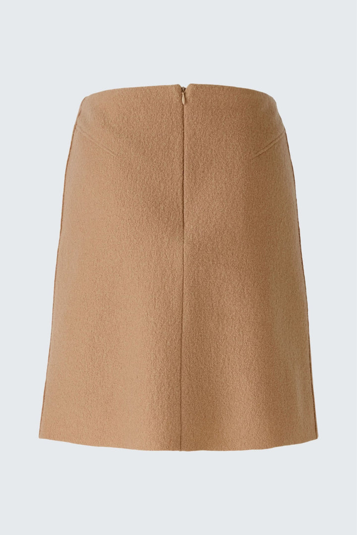 Jupe courte en lainage taille haute avec coupe droite et fermeture à glissière, idéale pour une allure élégante et raffinée.