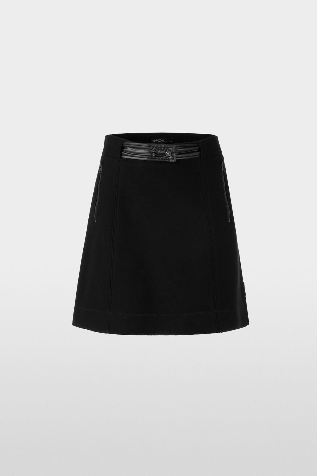 Mini-jupe en laine tricotée, légèrement évasée, avec taille en nylon brillant et élastique.
