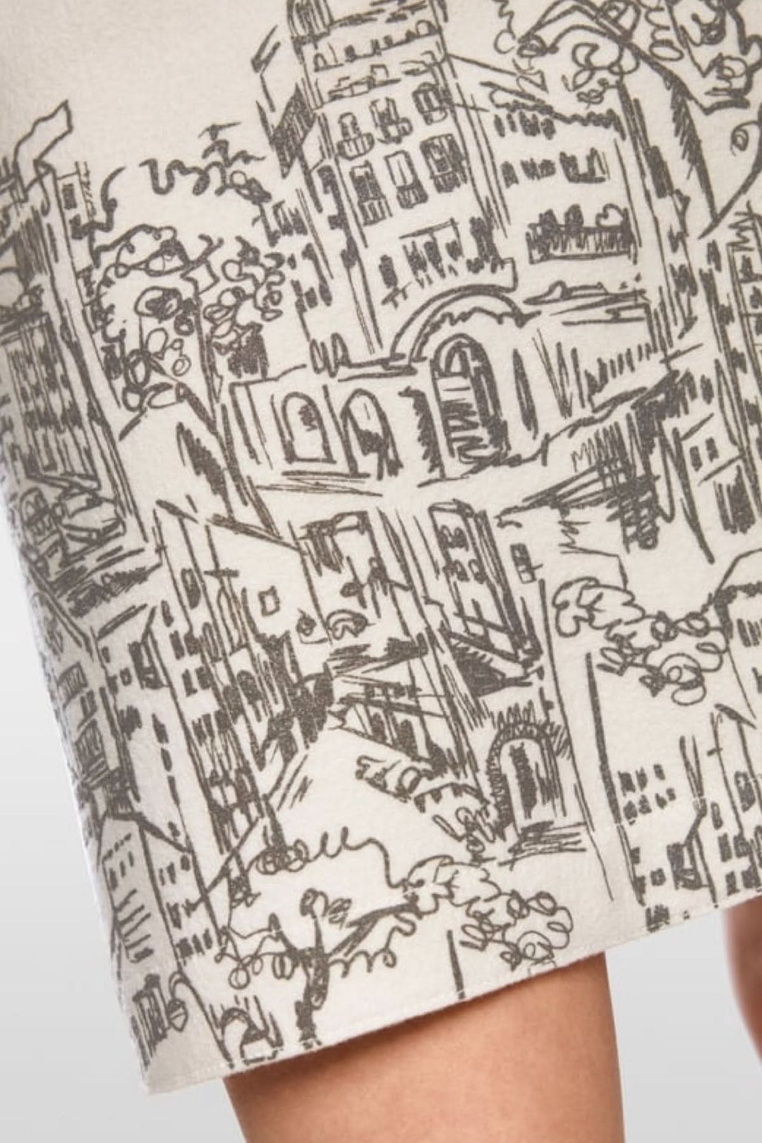 Jupe en laine vierge avec motif CITY, tricotée en Allemagne, vue de la texture détaillée du tissu.