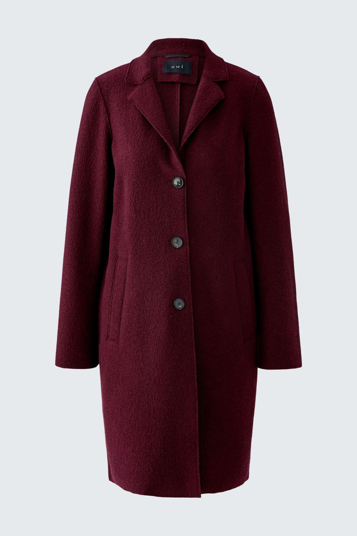 Manteau Mayson en laine bordeaux, coupe droite et longue avec col tailleur classique, fermeture à boutons, idéal pour la mi-saison et l’hiver.