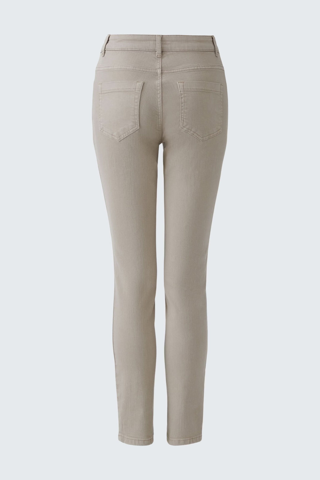 Pantalon ajusté beige avec tissu extensible et taille mi-haute, idéal pour un style chic et décontracté.
