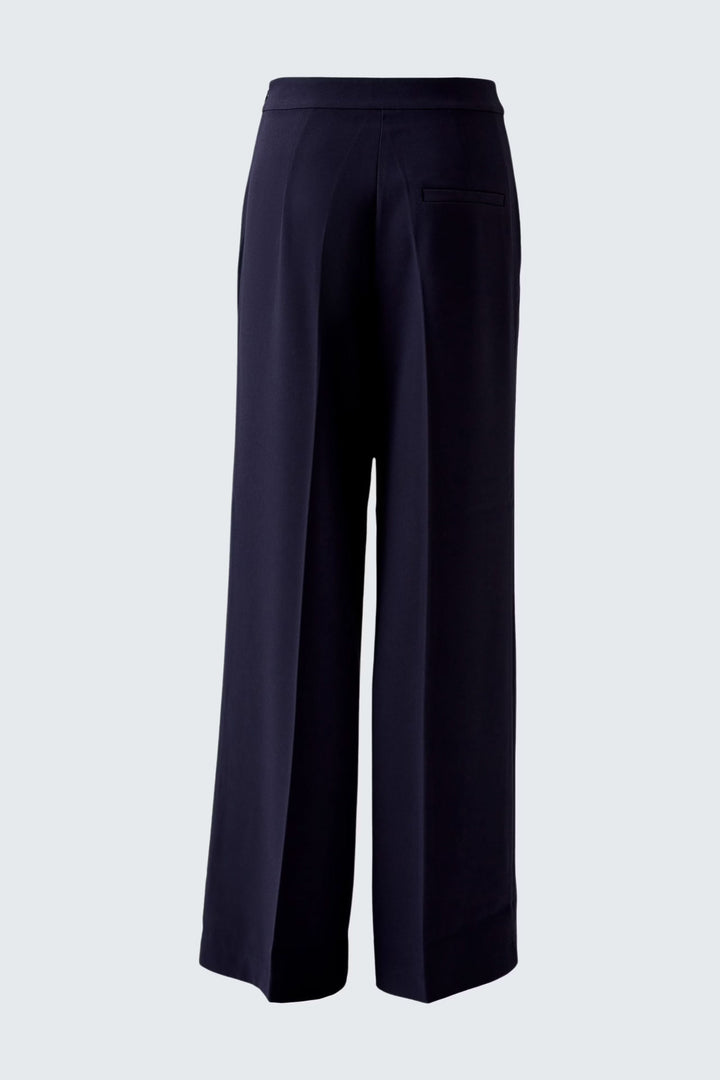 Pantalon en crêpe fluide à jambes larges, dos, offrant élégance et confort pour toute occasion.