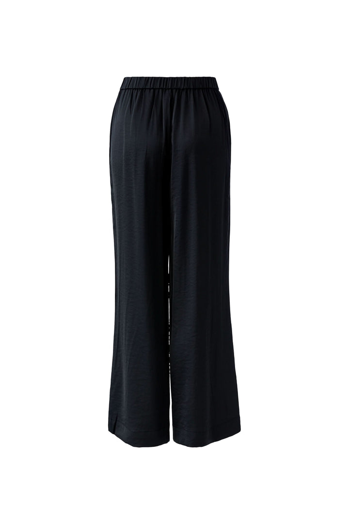 Pantalon fluide jambe large noir avec taille élastiquée, silhouette élégante et confortable, ajustement moderne pour un style quotidien.
