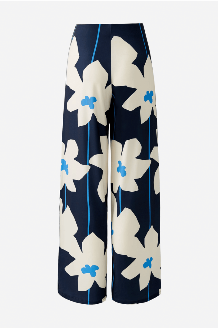 Pantalon ample à imprimé floral bleu et blanc, taille élastiquée, parfait pour un look chic et décontracté.