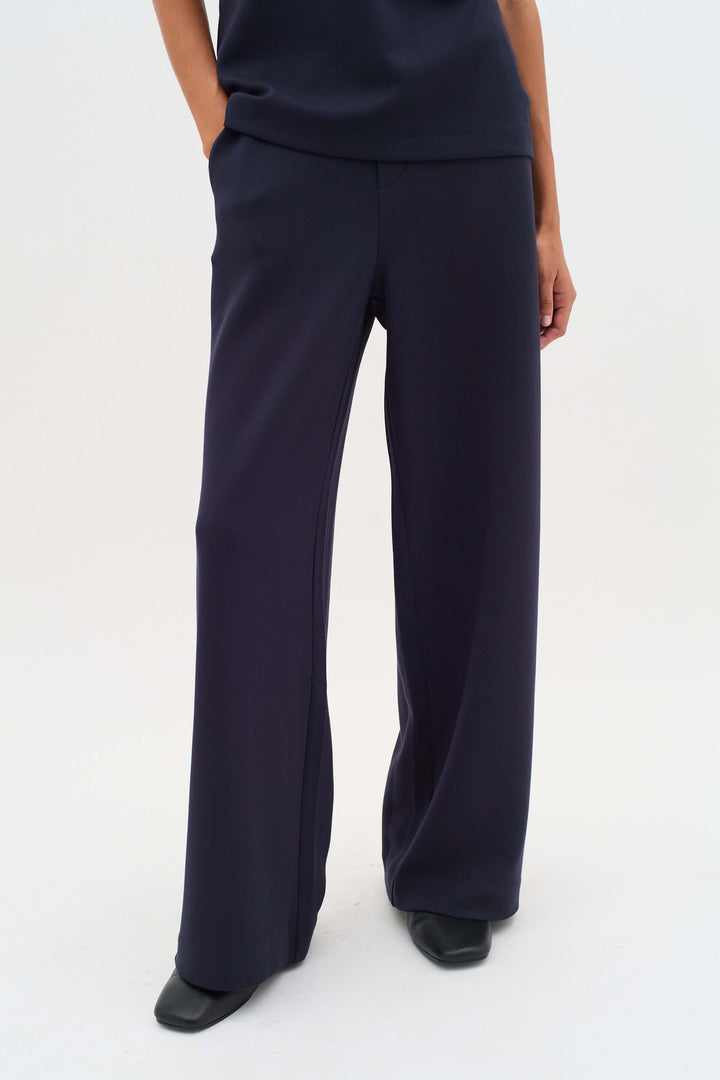 Pantalon à jambe large Gincette en tissu souple, coupe droite élégante pour un look contemporain et confortable pour le bureau.