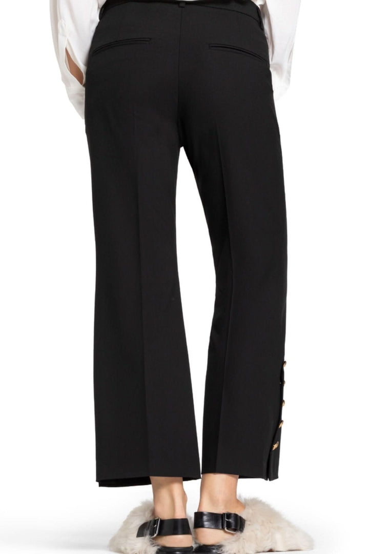 Pantalon élégant à coupe droite avec boutons dorés, confort et allure raffinée, parfait pour le bureau ou occasions spéciales.