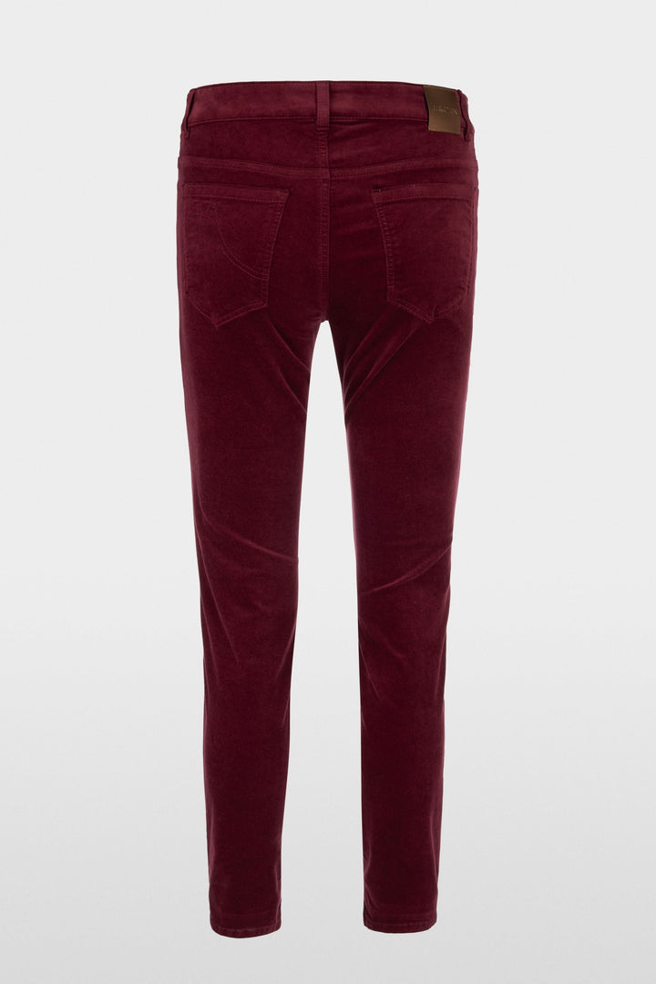 Pantalon taille basse en velours bordeaux avec coupe ajustée et poches arrière, une touche élégante à votre garde-robe.