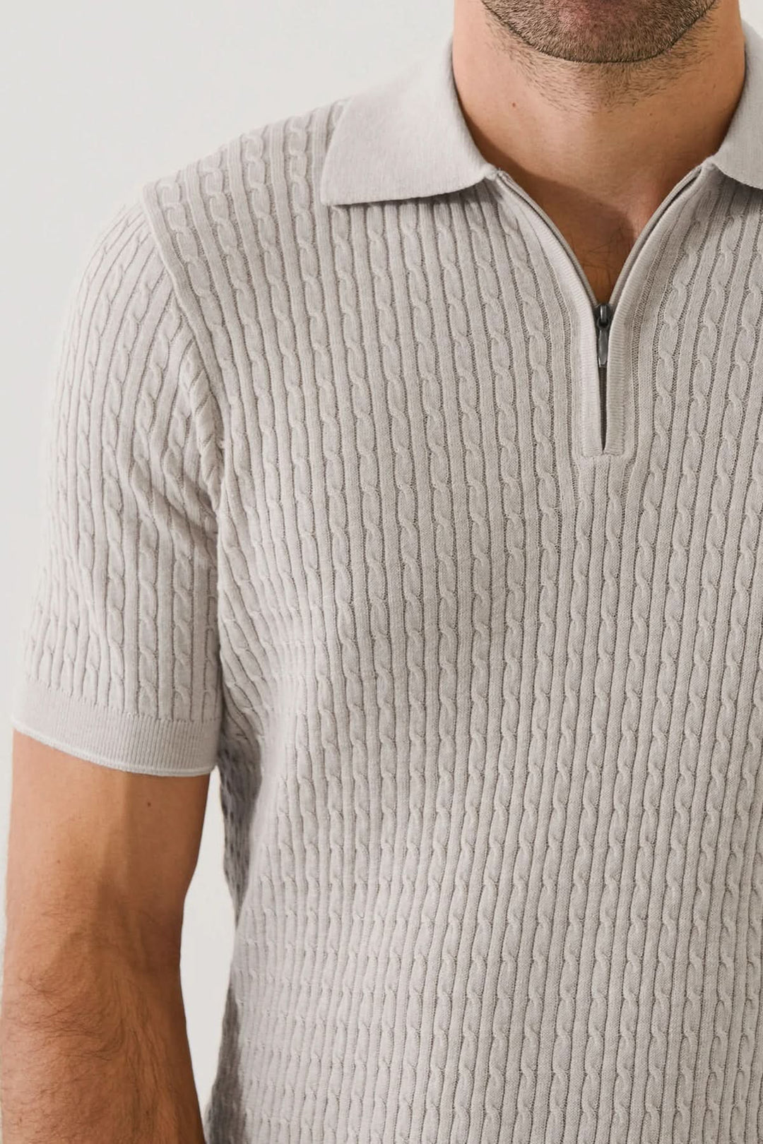 Polo tricot à fermeture éclair