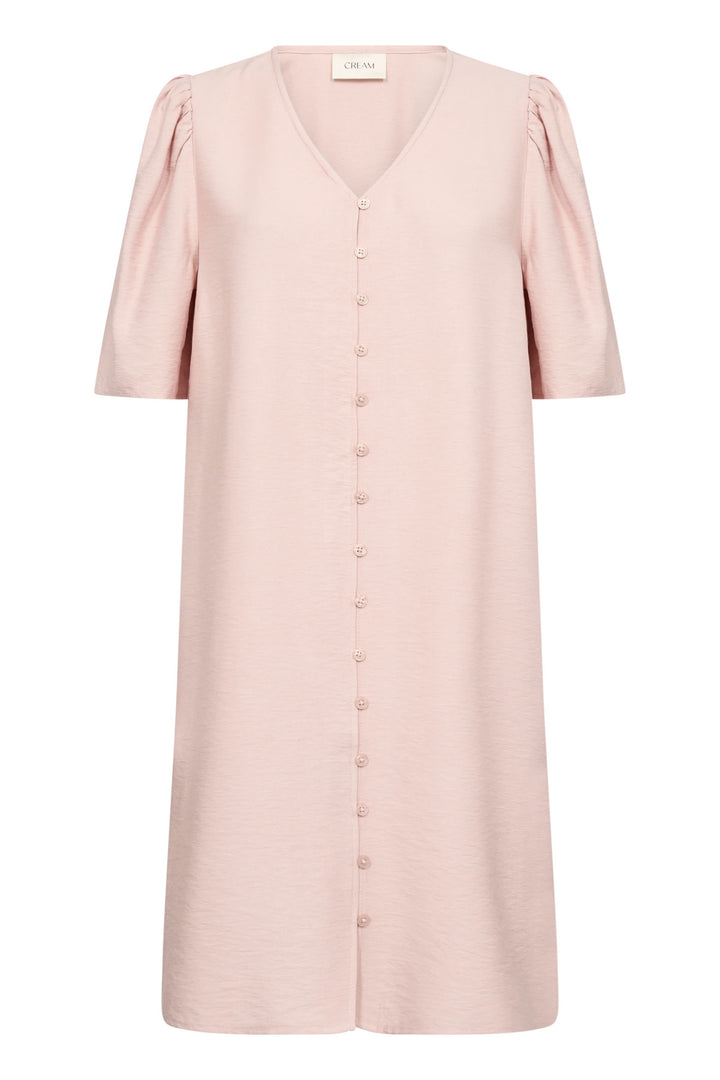Robe Bulie rose pâle, coupe fluide, col en V, manches courtes froncées, boutons ton sur ton, élégance minimaliste.