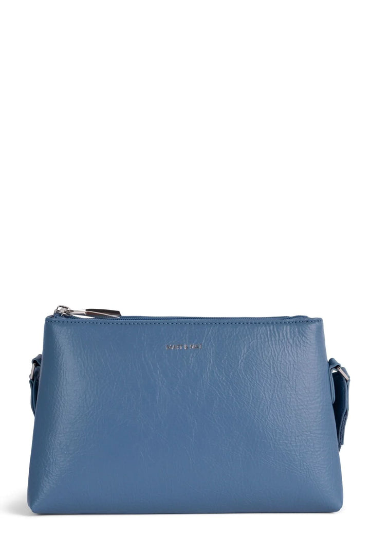 Sac à main compact bleu avec bretelle ajustable et deux compartiments zippés pour une organisation optimale.