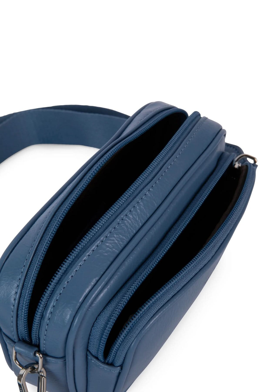 Sac à main Soleil bleu avec deux compartiments zippés et une bandoulière ajustable.