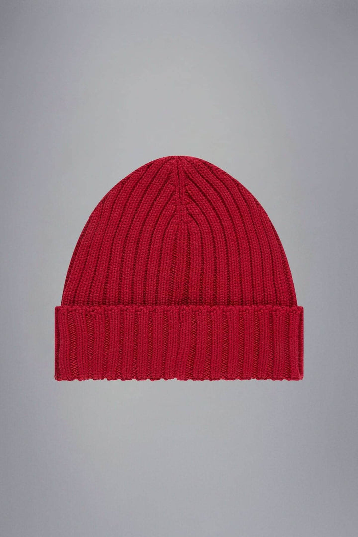 Tuque de laine rouge en maille côtelée, confortable et rétro, idéale pour l'hiver.
