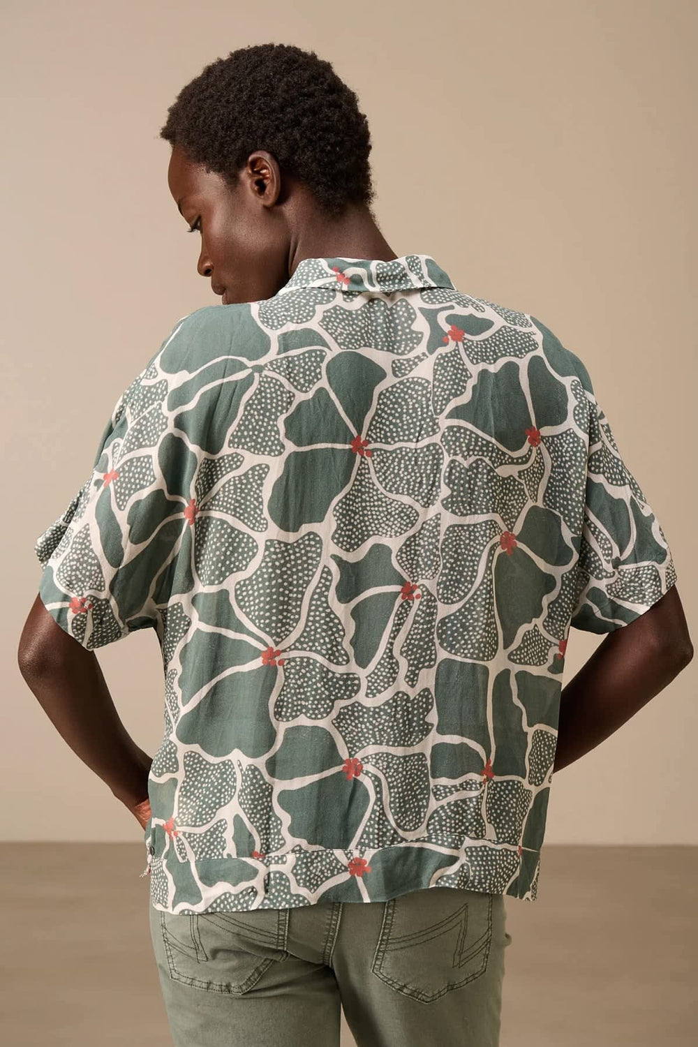 Front view of the multicolored Nile short-sleeved printed blouse with floral details - Valérie Simon