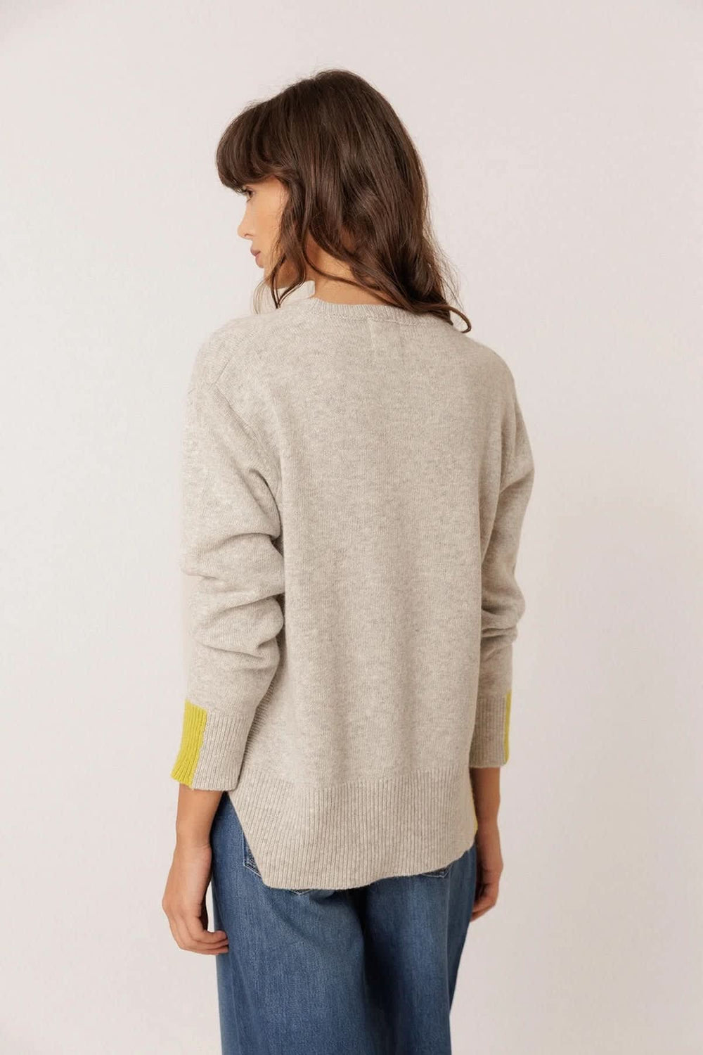 Front view of women's knit sweater with contrasting details Indi & cold