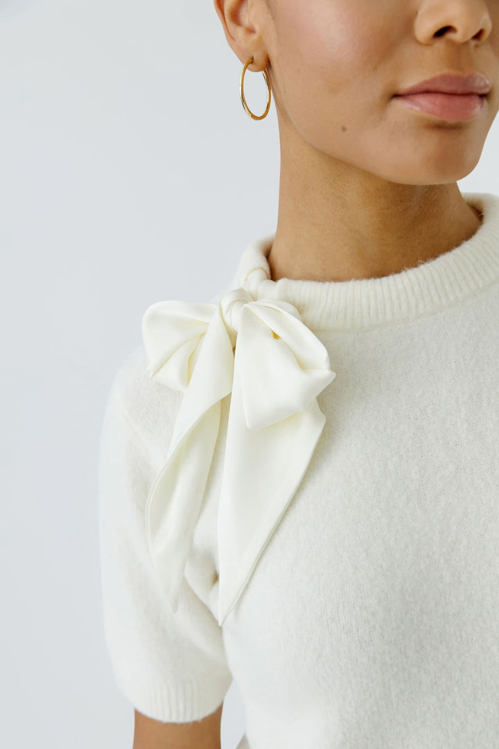 Vue de face chandail boucle Oui pour femme beige - Valérie Simon