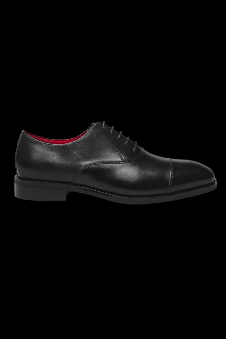 Side view of black leather brogue shoes Au noir for men - Valérie Simon