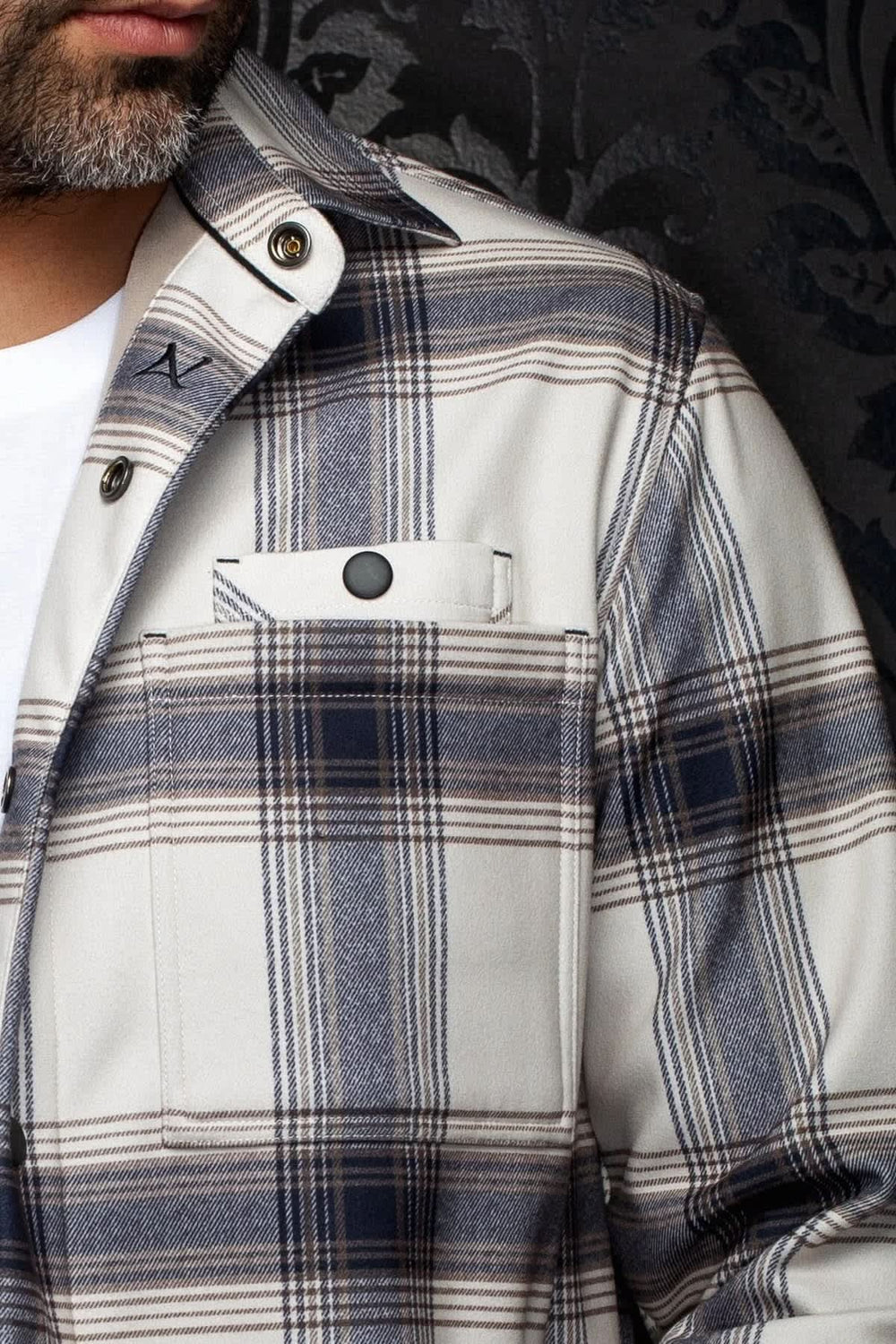 Men's black plaid sport shirt with snap buttons