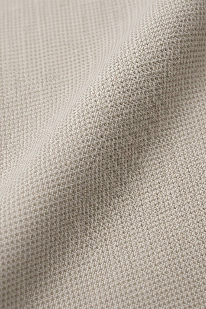 Full-length side view of the textured Lief Horsens men&