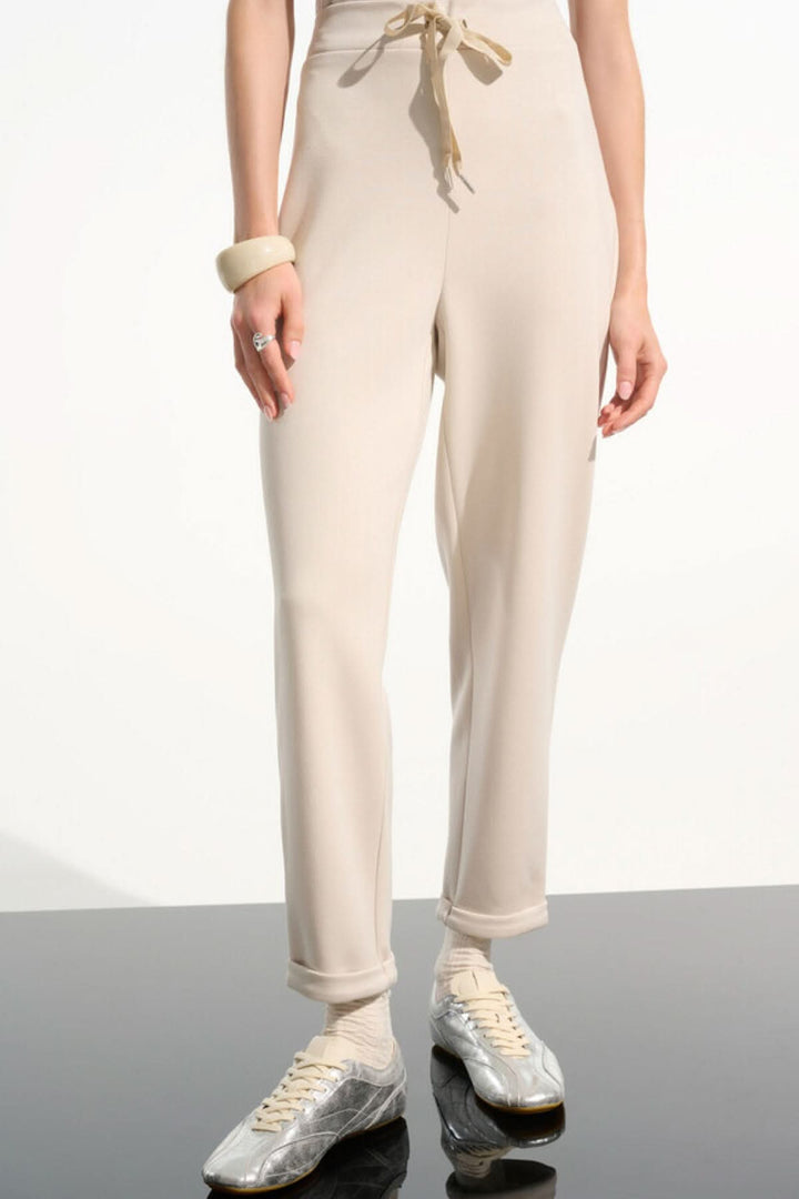 Pants with a knot on the right side