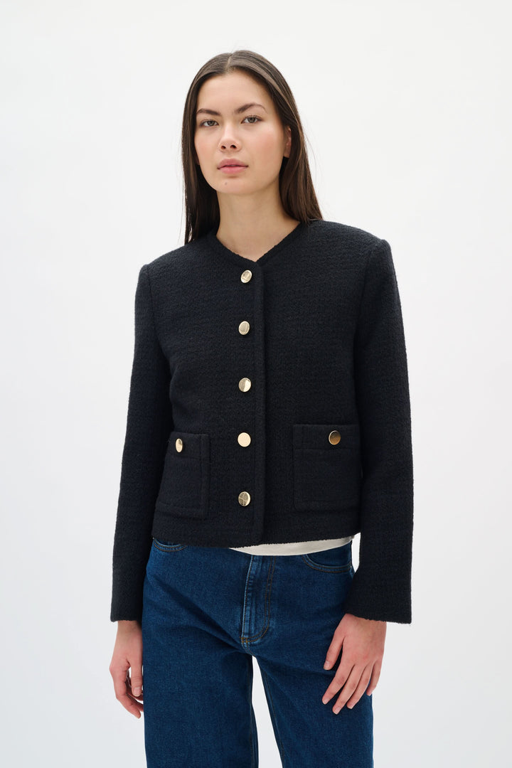 Veste courte texturée à boutons dorés