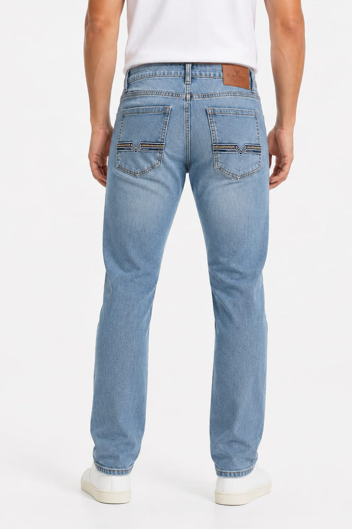 Vue latérale jean délavé Black Bull pour homme gris moderne avec détails usés - Valérie Simon